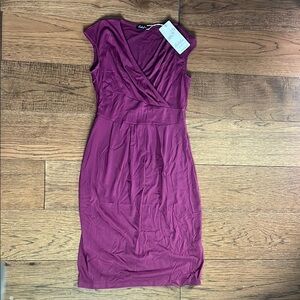 Purple woman’s cute midi dress